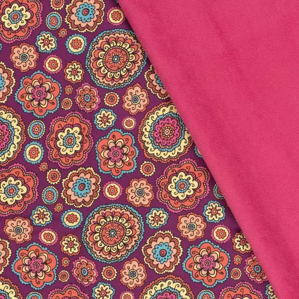 Mandala sur fond violet